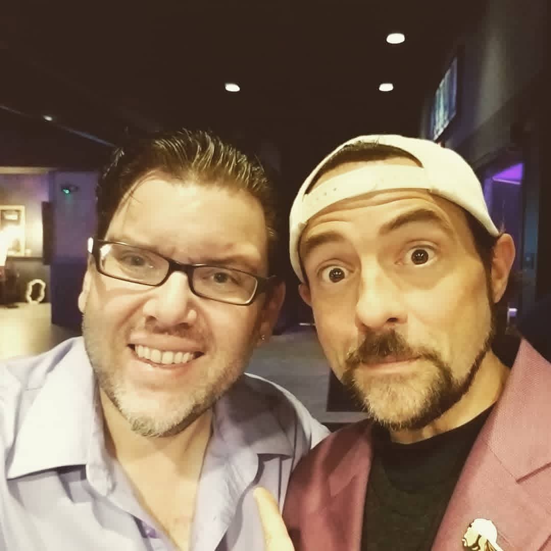 Jack Miele in a selfie with filmmaker Kevin Smith at an event